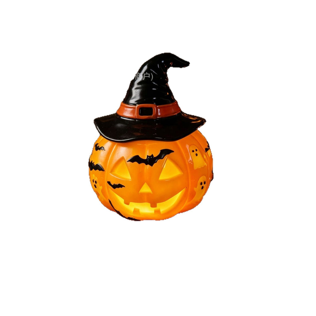 A Halloween pumpkin jack-o'-lantern decoration lamp with a black witch hat, shown against a plain white background.