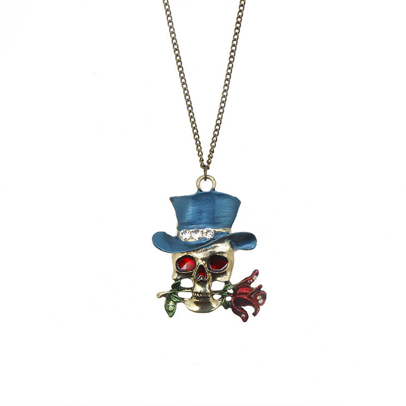 Skull pendant with a blue top hat and red rose on a white background