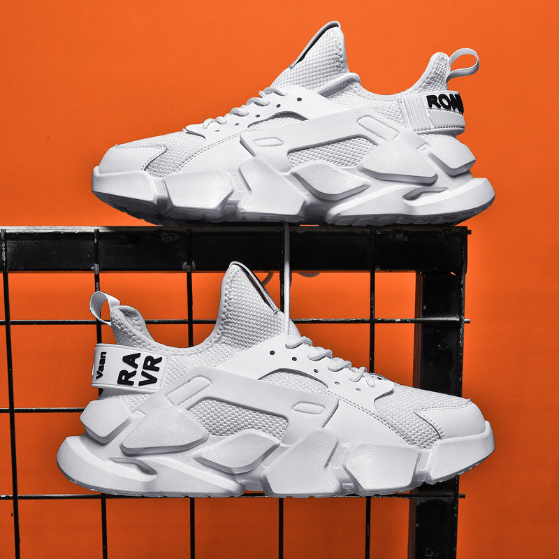White sneakers with black text on an orange background