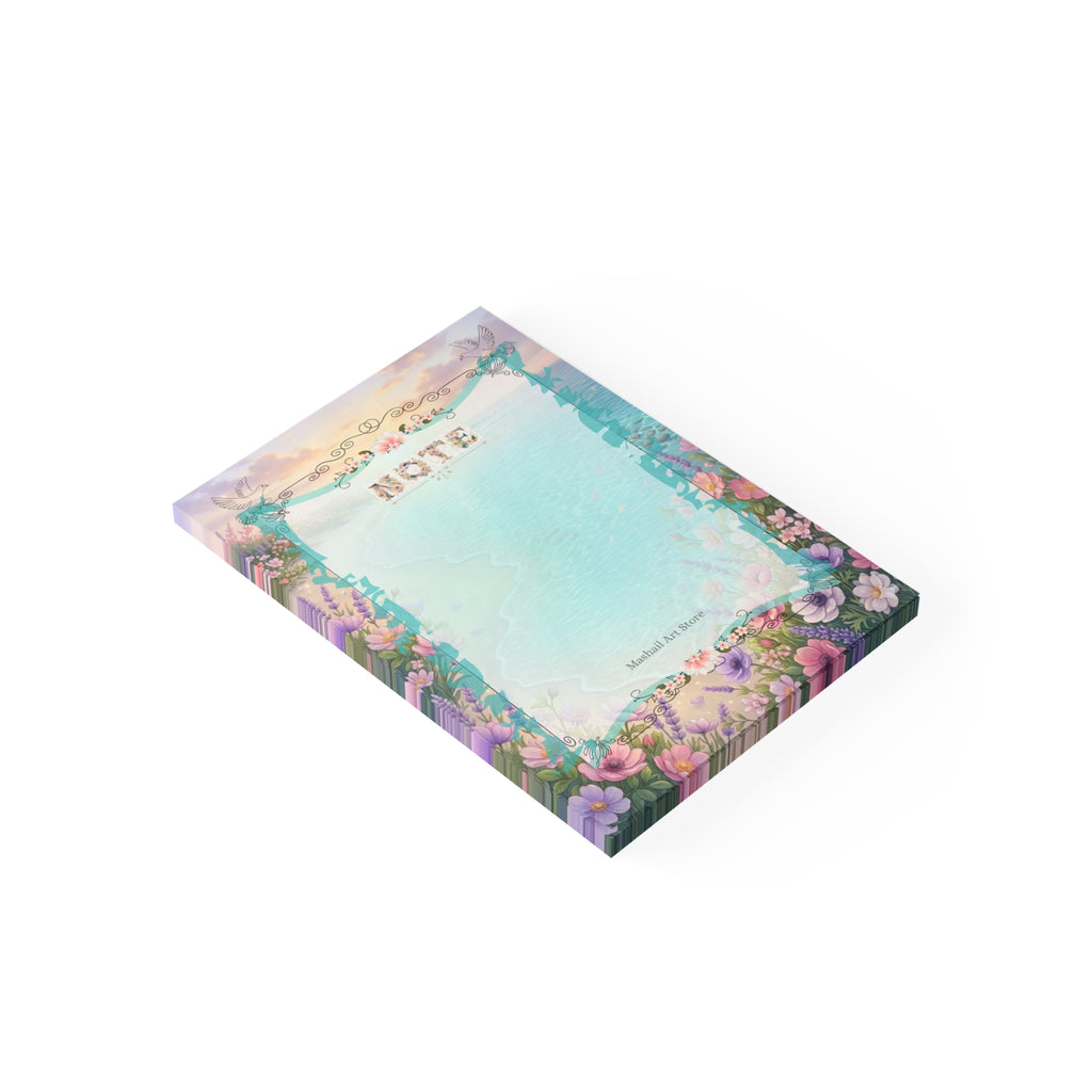 Floral design notepad with 'Note' text on a white background