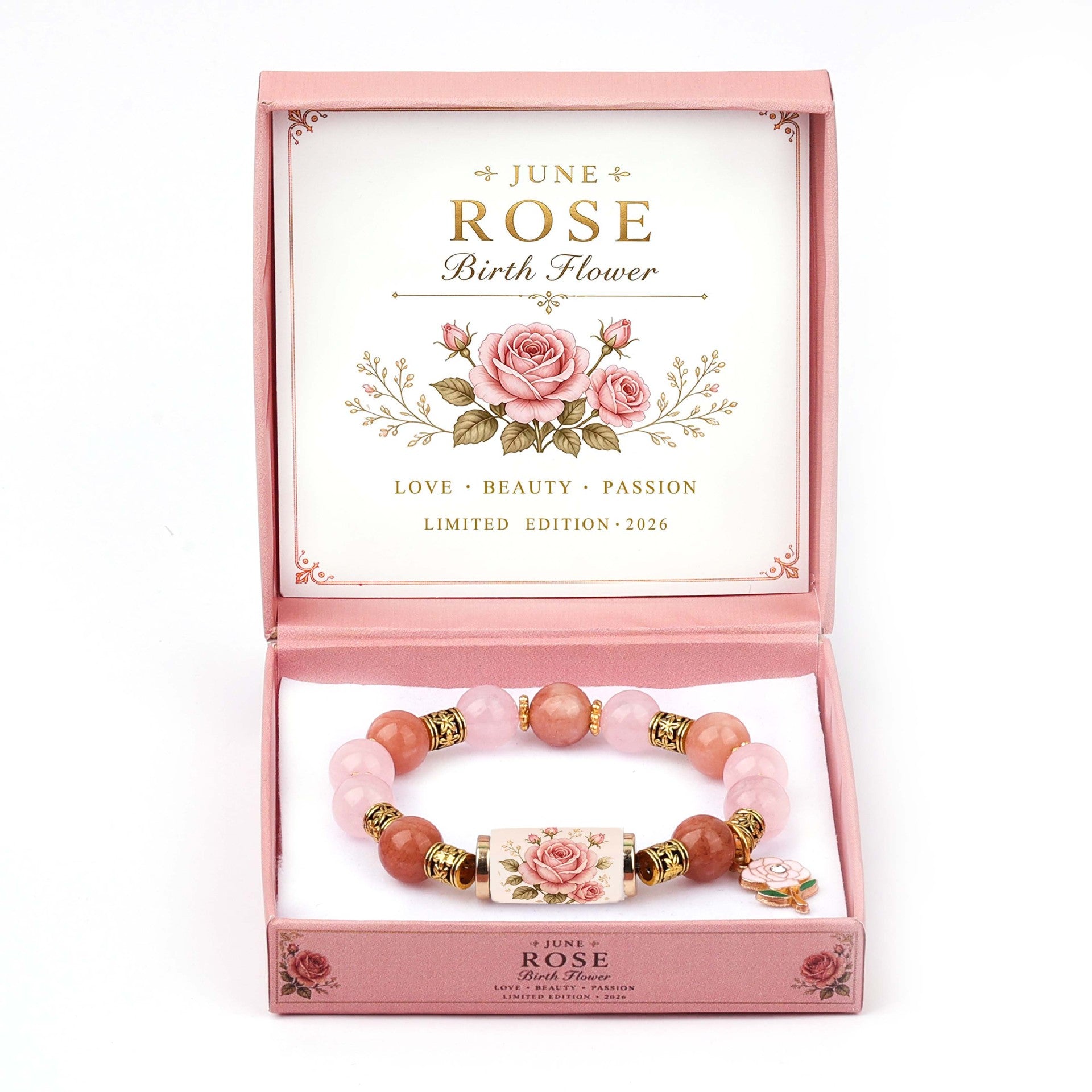 A pink beaded bracelet with rose-themed charms, presented inside an open pink gift box labeled 'June Rose Birth Flower' on a white background.
