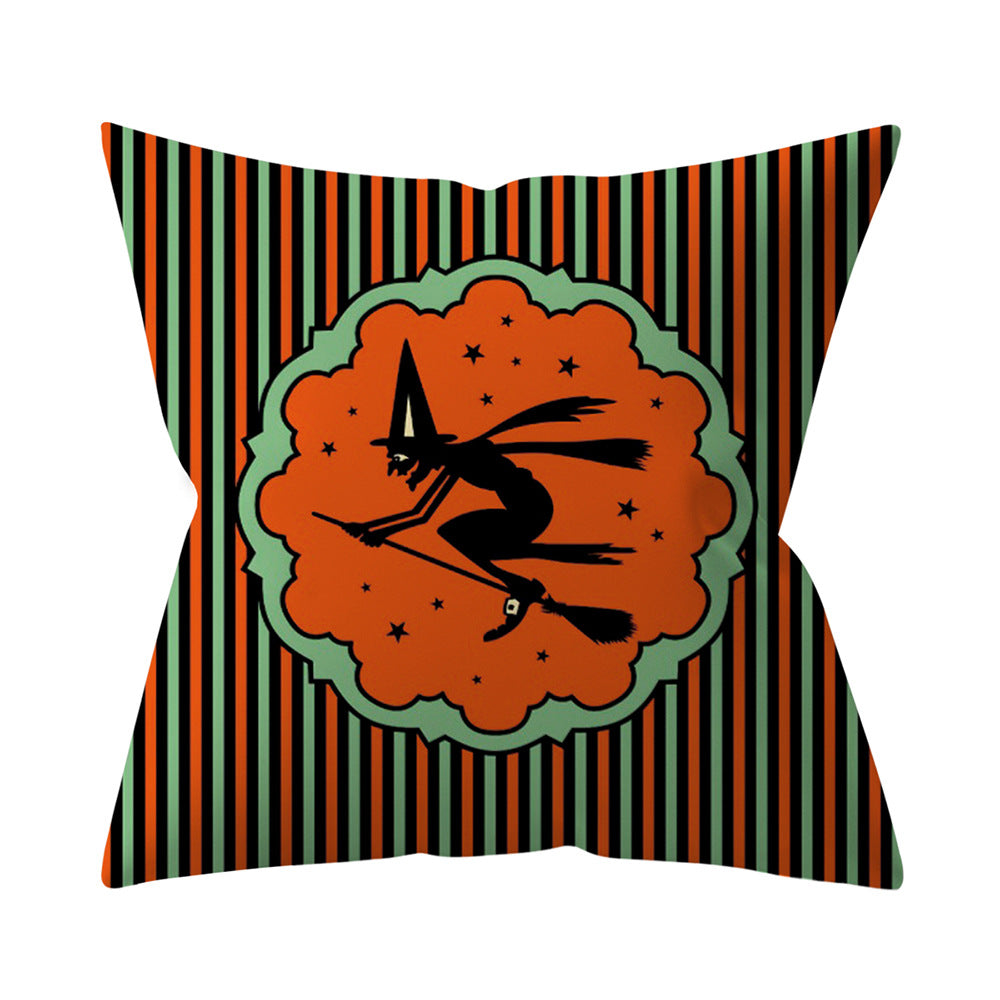Decorative pillow with witch design and striped pattern