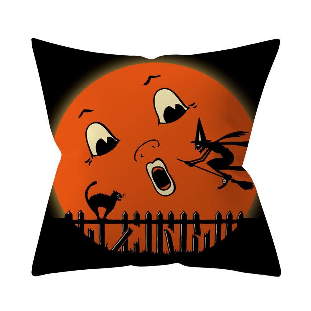 Halloween-themed decorative pillow with a witch, cat, and full moon design.