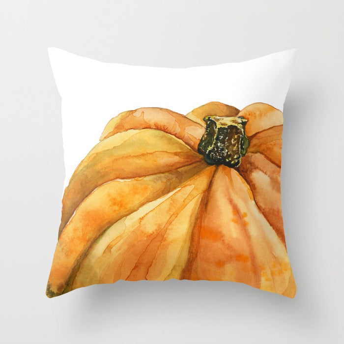 Decorative pillow with a pumpkin design on a white background