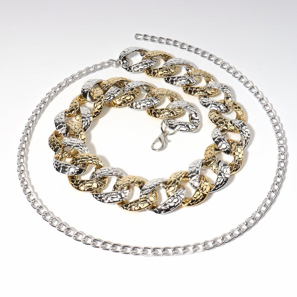Three chain necklaces of different styles on a white background