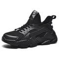 Black sneakers with brand logo on a white background