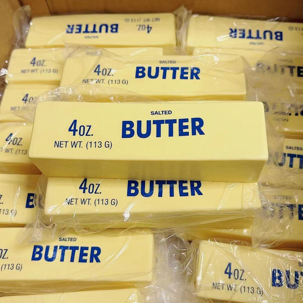 Multiple packages of 4 oz butter bars stacked together.