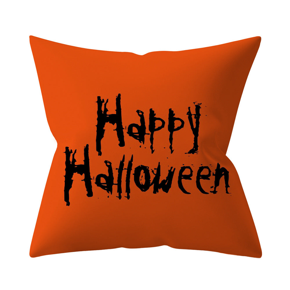 Orange pillow with 'Happy Halloween' text on a white background