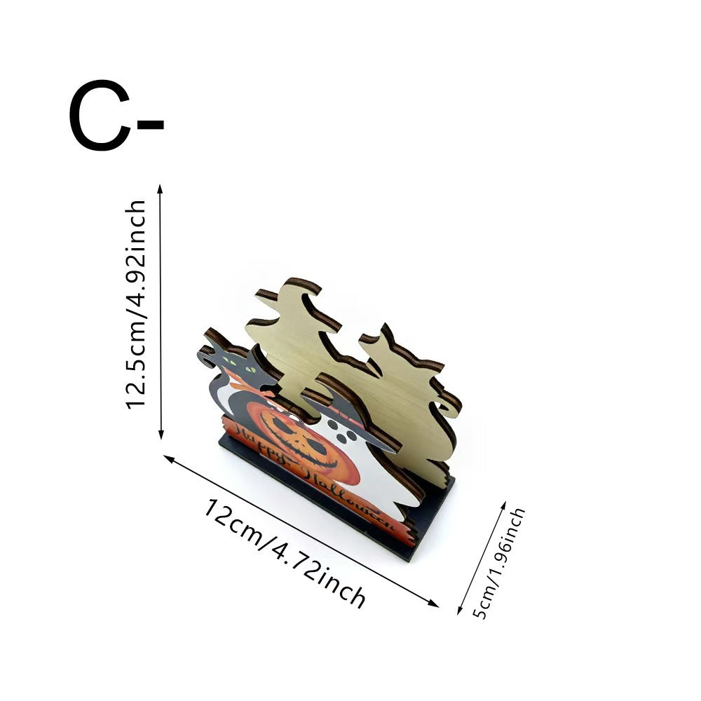 A small decorative wooden stand or plaque with layered cutout shapes and printed orange, black, and white graphics on a white background. Black dimension arrows and text show measurements of 12.