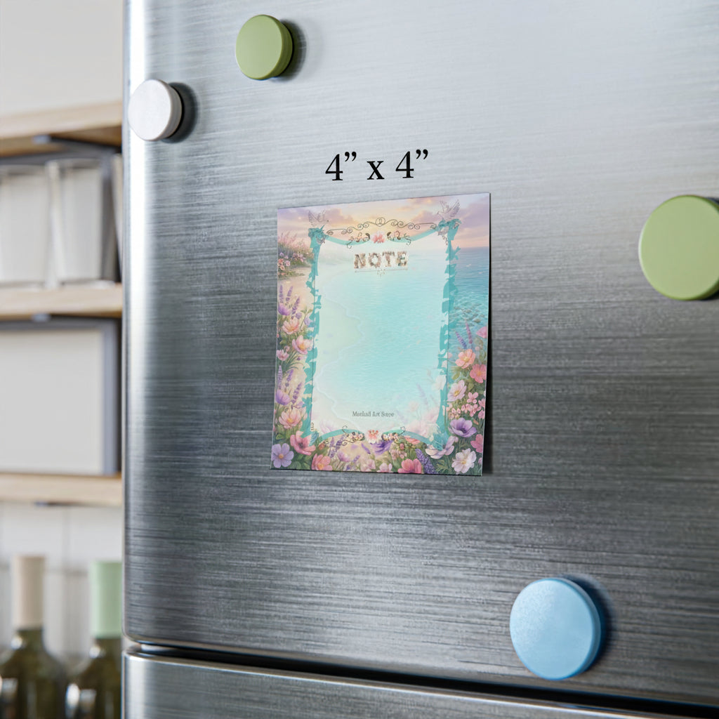 Fridge with a decorative magnet featuring a floral design notepad and text on a metallic surface.