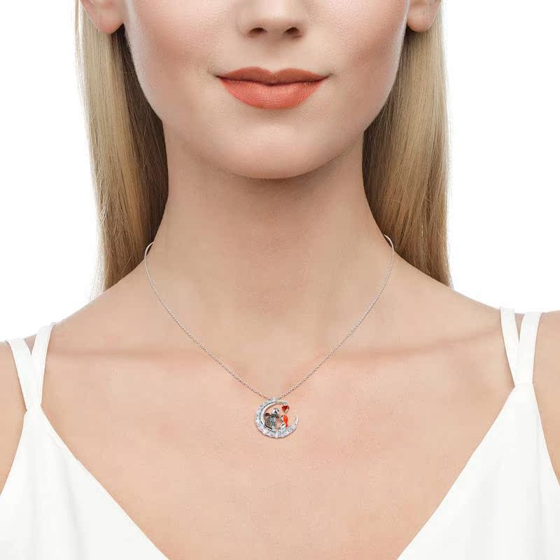 Necklace with a pendant worn by a model on a white background