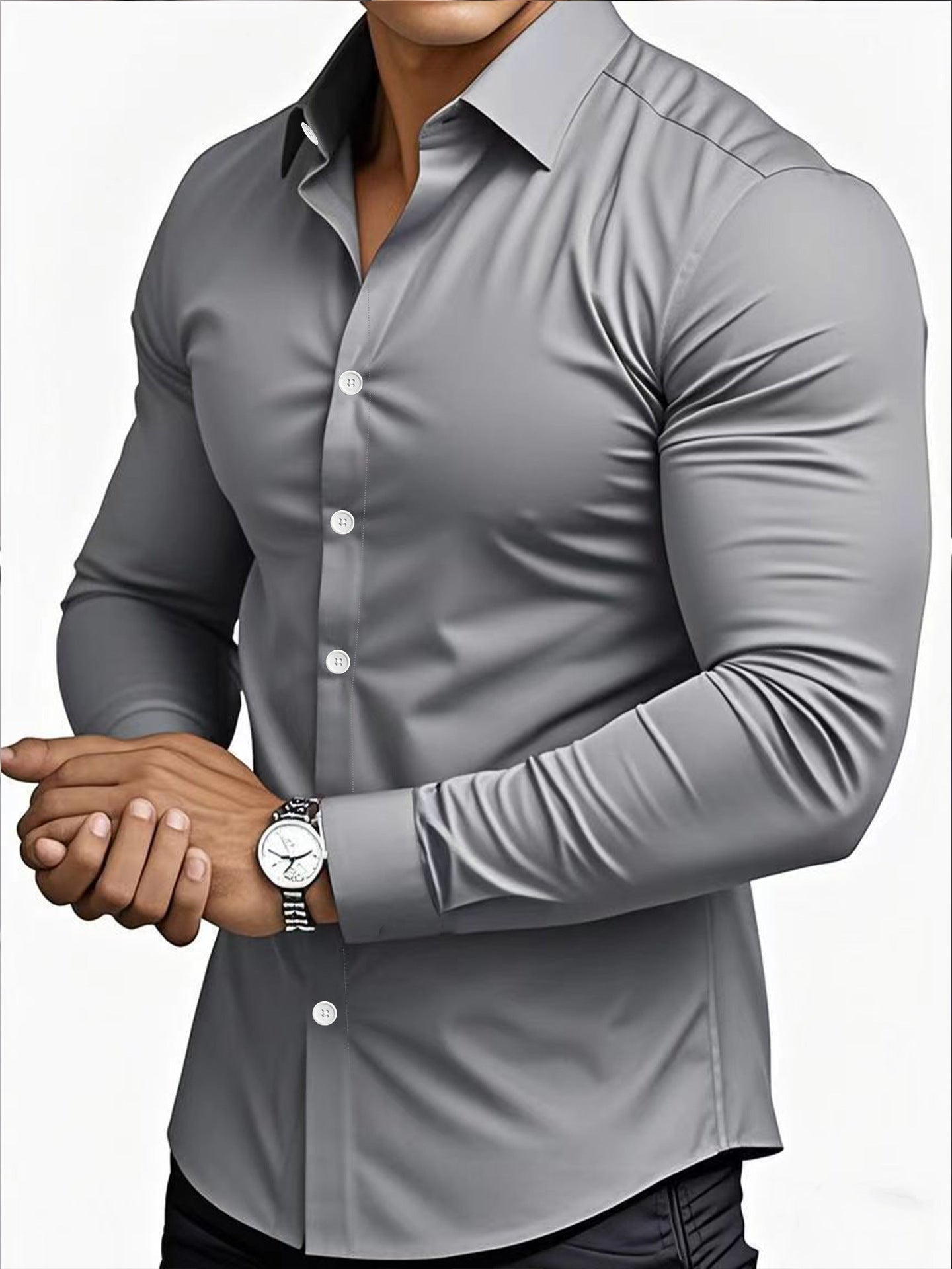 Gray button-up shirt worn by a person on a white background