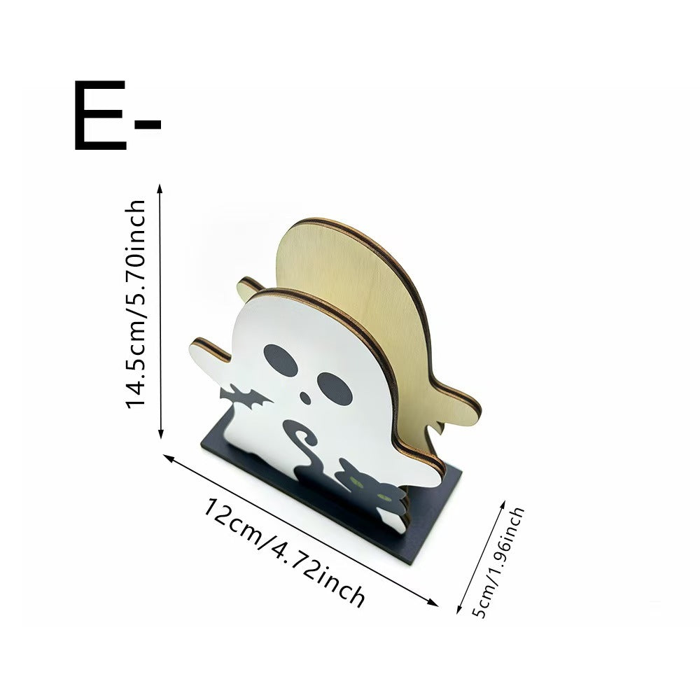 A ghost-shaped tabletop stand or holder shown on a white background with dimension lines and text indicating measurements: 14.5 cm / 5.