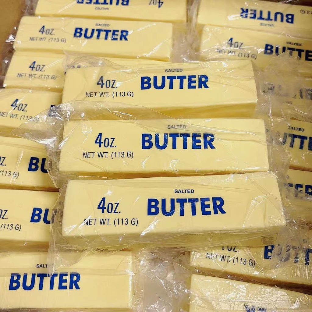 Multiple packages of 4oz salted butter squishy stacked together.