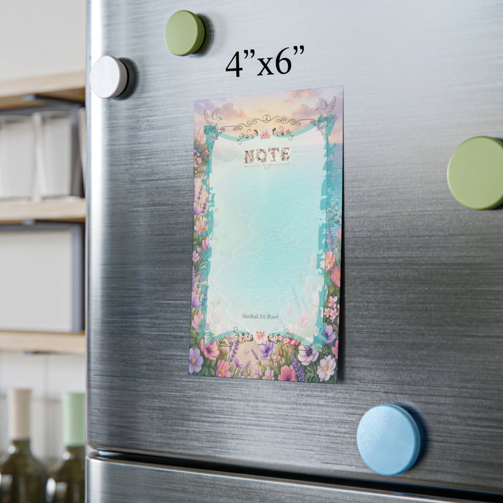 Decorative magnetic notepad on a refrigerator with floral design and 'NOTE' text.