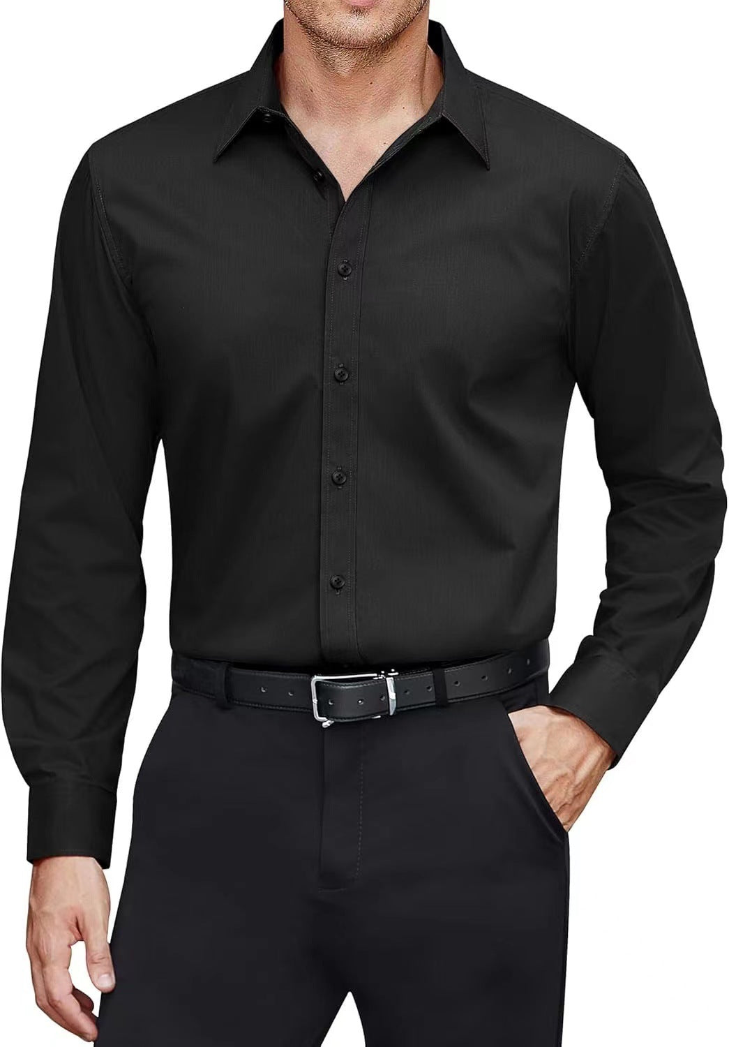 Man wearing a black dress shirt and pants on a white background