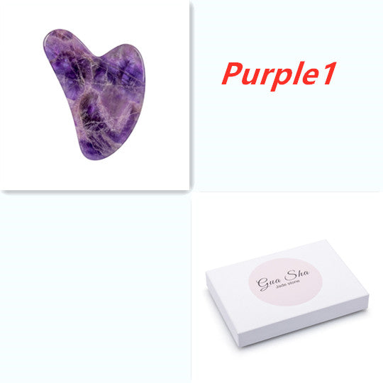 Purple Gua Sha tool with a white box labeled 'Gua Sha' on a white background