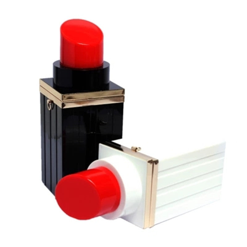 Lipstick with red cap and black and gold case on a white background