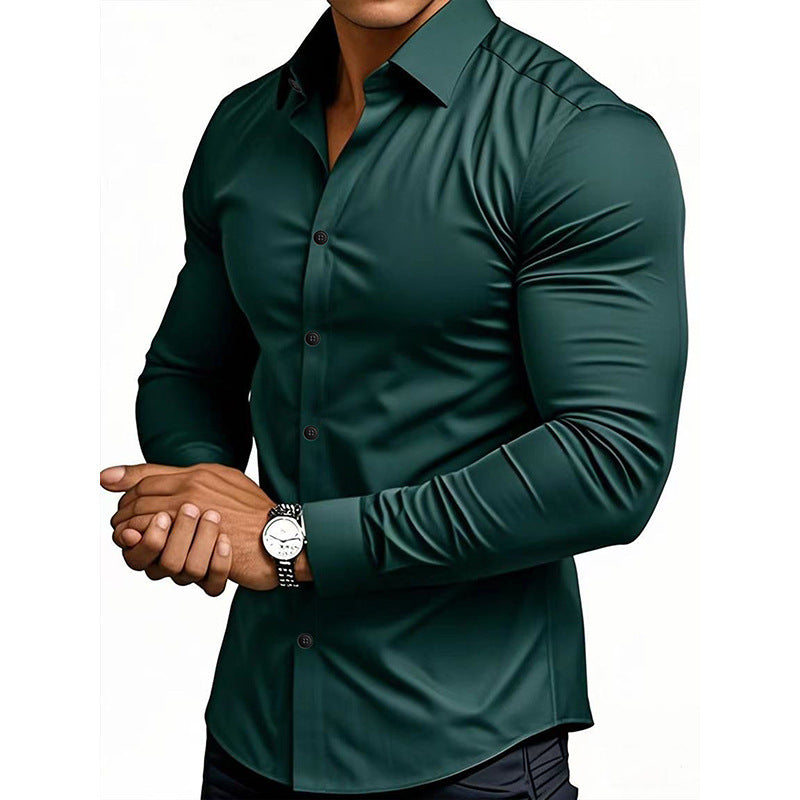 Person wearing a dark green shirt with a watch on a white background