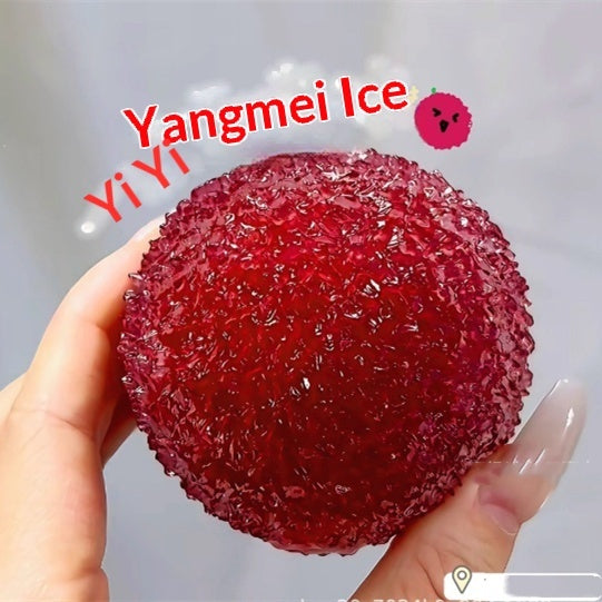 Red textured ball Squishy held by a hand with 'Yangmei Ice Yi Yi' text overlay.