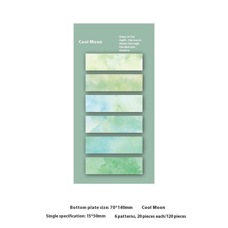Packaging of Cool Moon stationery with watercolor designs on a green background