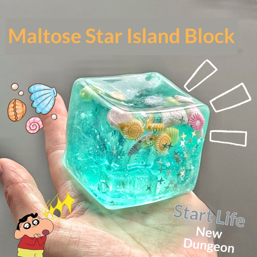 Maltose Star Island Block with sea-themed decorations on a hand, featuring cartoon characters and text.