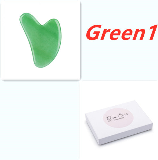 Green jade tool with 'Green1' branding and a box labeled 'Gua Sha' on a white background.