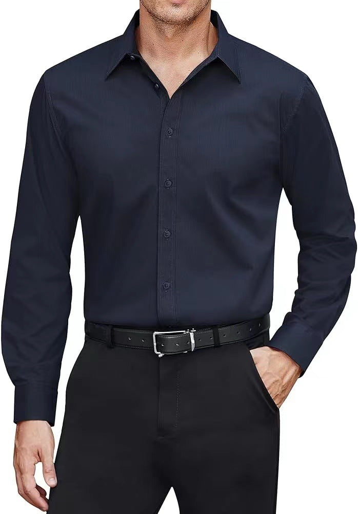 Man wearing a black dress shirt and pants on a white background