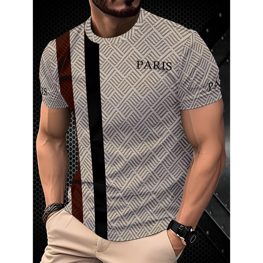 Man wearing a patterned shirt with 'PARIS' text, standing against a dark textured background.