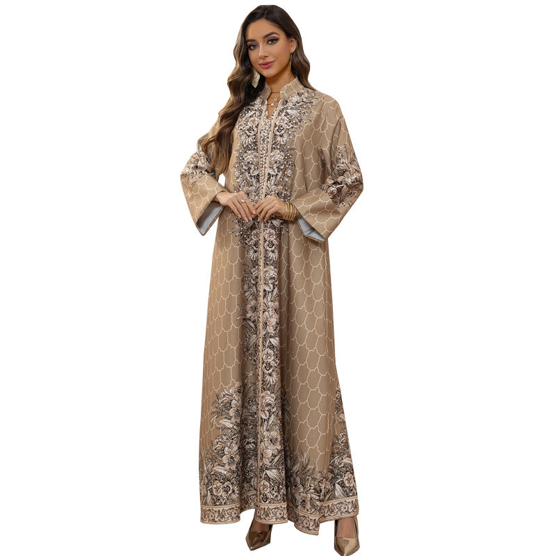 Woman wearing a beige and brown patterned dress on a white background