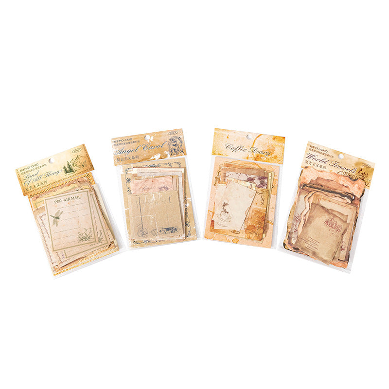 Four packages of tea leaves on a white background