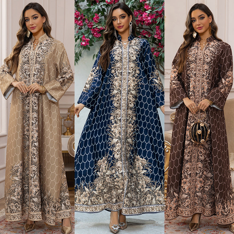 Three women wearing patterned dresses in different colors with a decorative background.