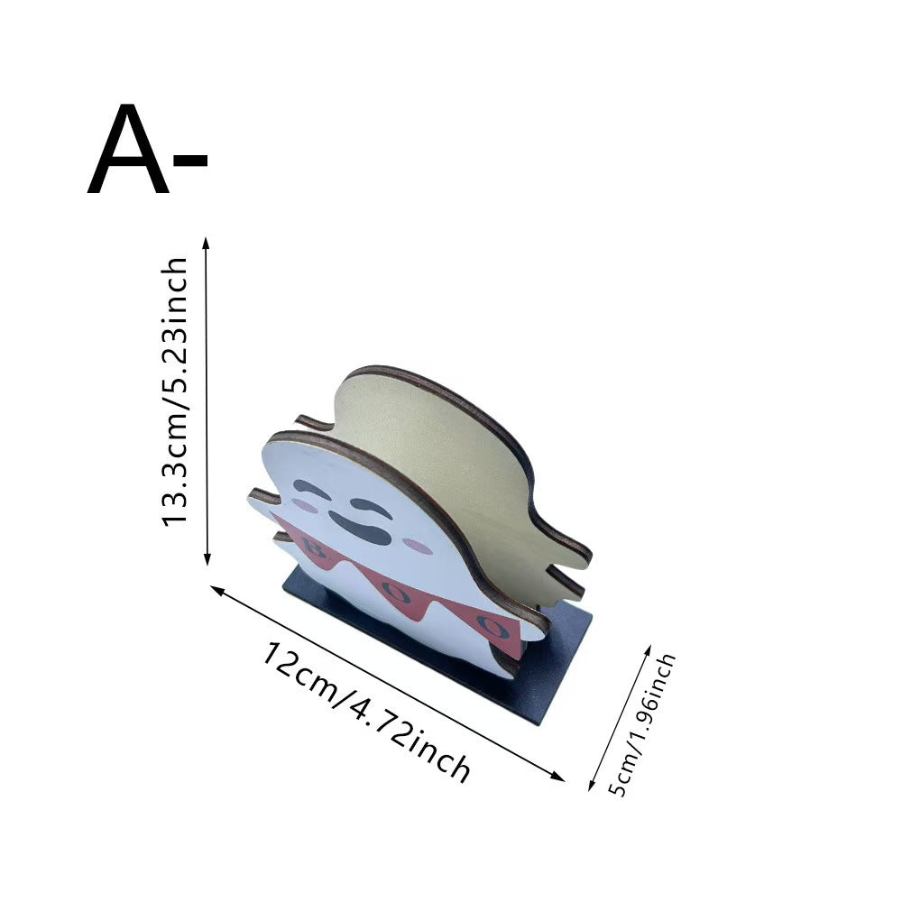 A ghost-shaped wooden desk accessory with a cute face, shown with dimension lines indicating its height of 13.3cm (5.