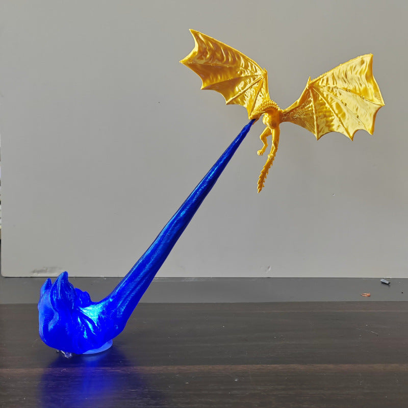 Blue and gold dragon figurine on a plain background