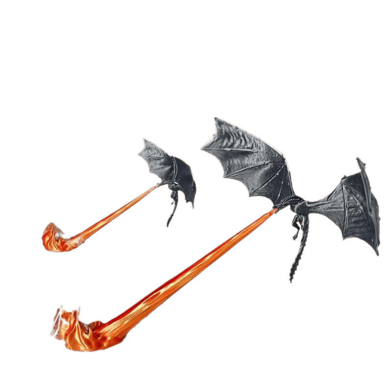 Two black bat-shaped wall hooks with long orange flame-like decorative rods, shown on a plain white background.