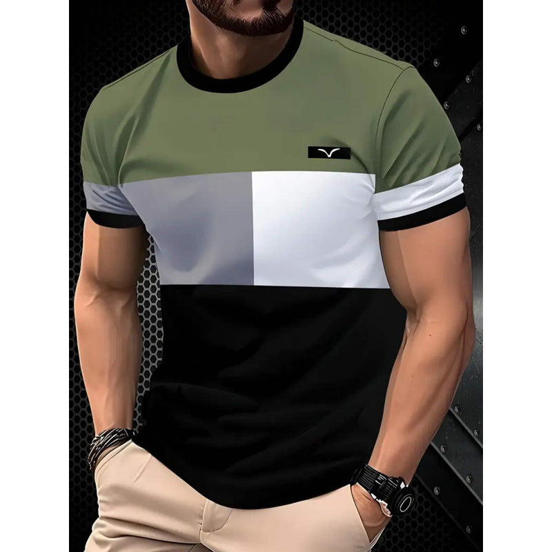 Man wearing a green, white, and black checkered t-shirt with a brand logo on a dark background.