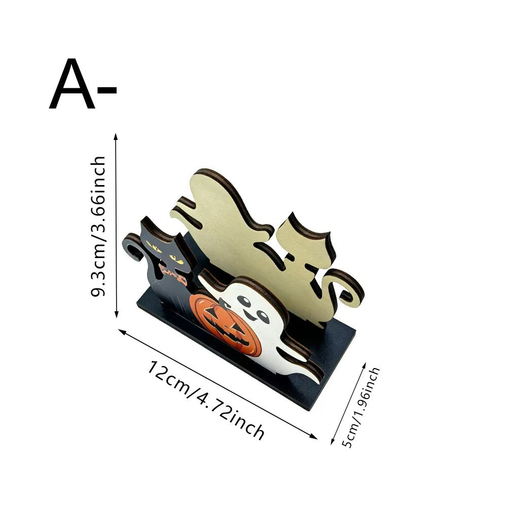Halloween-themed wooden standee with ghost and pumpkin designs, shown with dimension labels indicating 12cm length, 9.3cm height, and 5cm width on a white background.