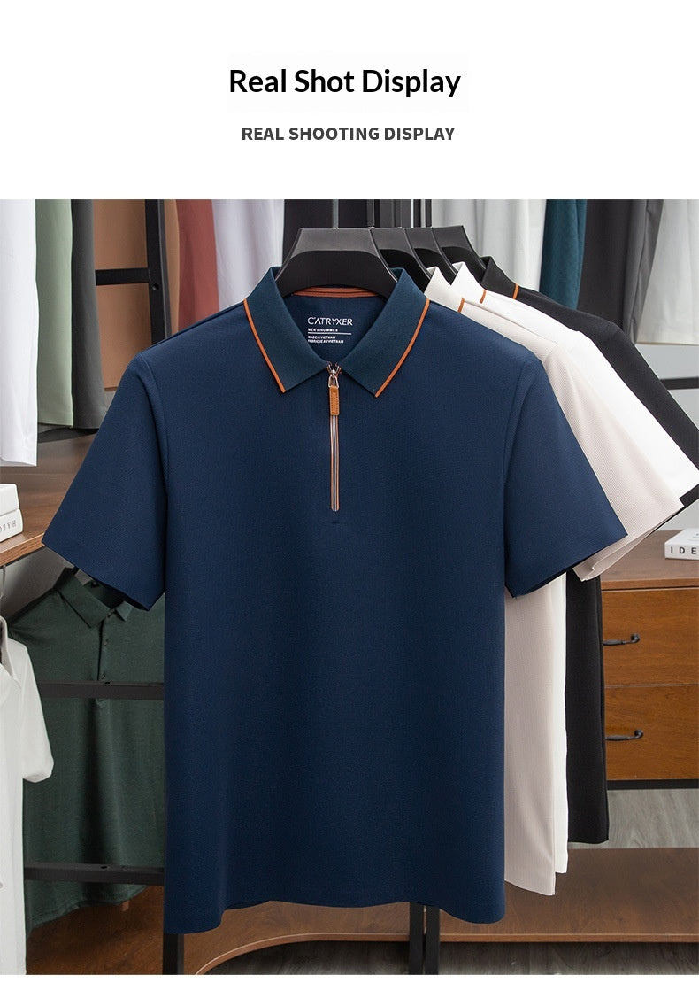 Navy blue polo shirt with orange zipper on a hanger against a clothing store background
