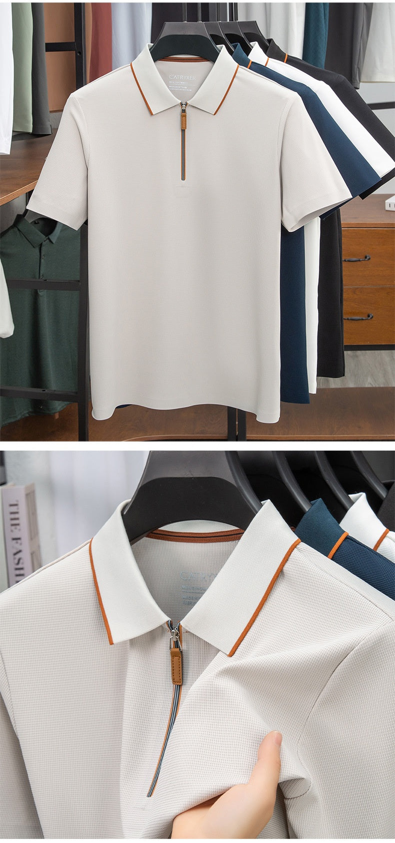 White polo shirt with orange trim on a hanger, close-up of collar details.
